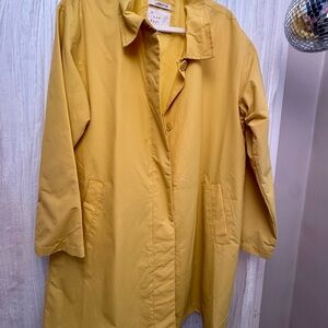 A New Day Bright Yellow Jacket